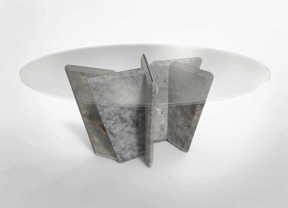 base de mesa em pedra e tampo em vidro